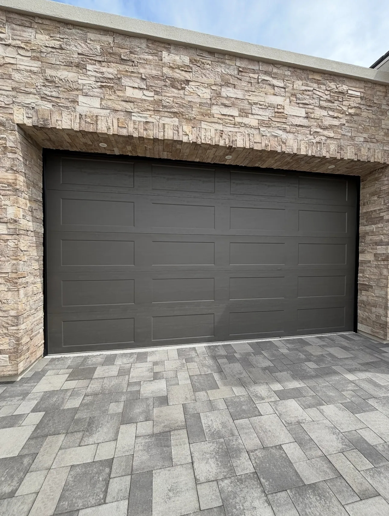 Dark Raised-Panel Stone Exterior